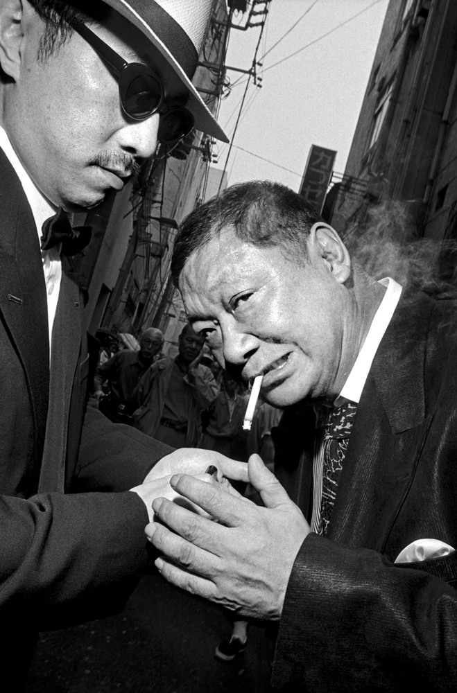 JAPAN. Asakusa. George ABE, right, an ex-Yakuza member and celebrity writer. Yakuza model themselves on American gangster fashion from 1950s. 1998.