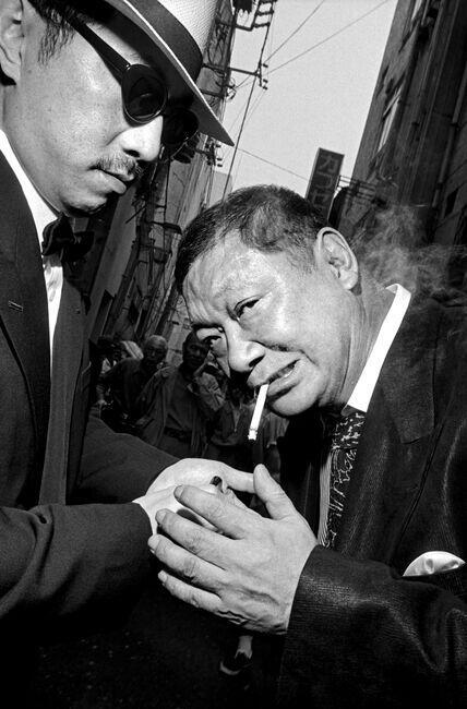 ©Bruce Gilden / Magnum Photos, Bruce Gilden JAPAN. Asakusa. George ABE, right, an ex-Yakuza member and celebrity writer. Yakuza model themselves on American gangster fashion from 1950s. 1998.